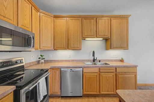 Under cabinet lighting and lots of kitchen cabinet space.