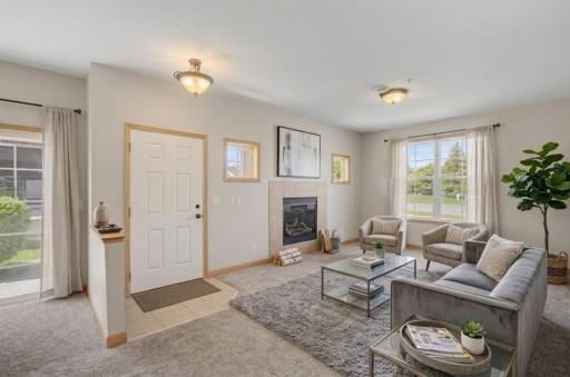 Virtually staged - end unit with lots of natural light!
