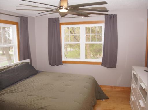 Bamboo floors run through the main floor an Bedrooms! Bedrooms have newer upgrade windows and Ceiling Fans!
Main Bedroom has a walkthrough door to main bath.