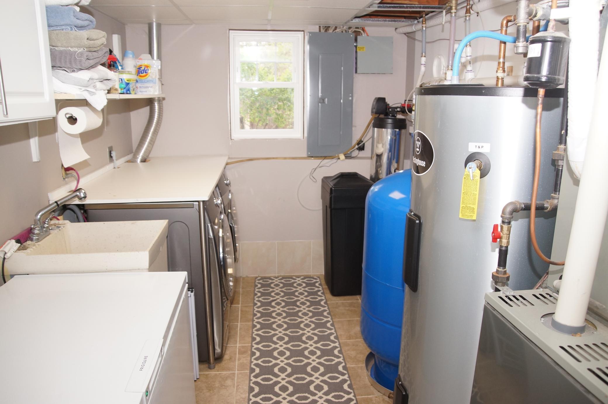 Laundry with Folding table Plus High-end Washer and Dryer Stay!