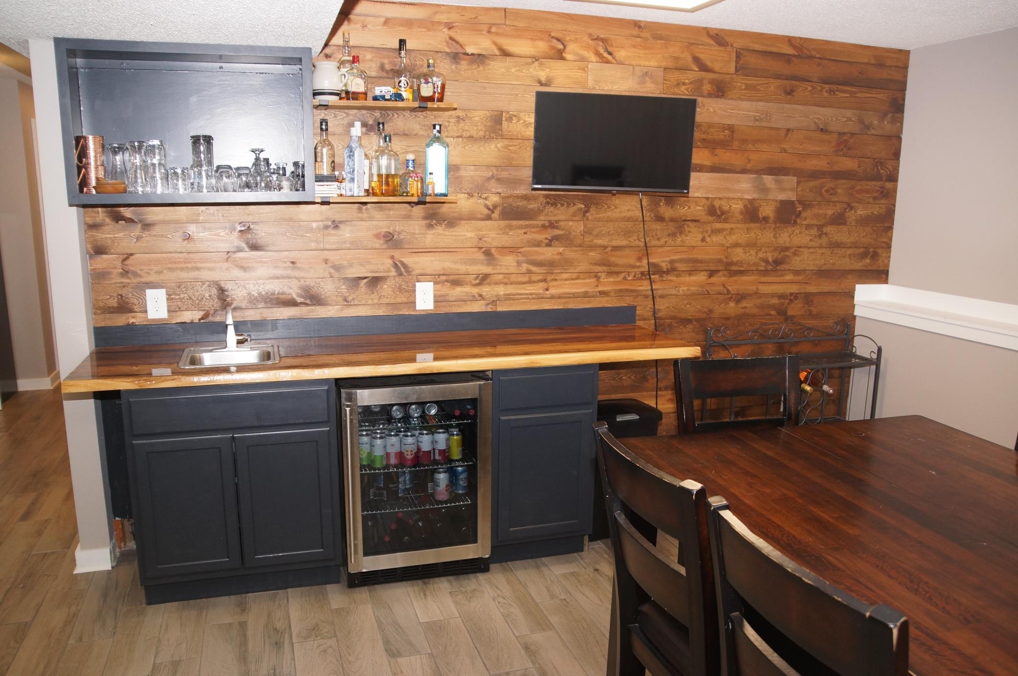 Wet Bar and Game Table Area next to the Walk-Out Siding Door to Patio and Back Yard!