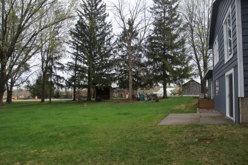 Walk-out to a Concrete Patio and a large backyard offering ample space for outdoor activities and entertainment. Perfect for yard games, and with the potential for fantastic additions such as Pool? ,Fire Pit, Outdoor Kitchen, Playground equipment !