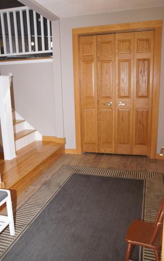 Large Foyer Entry with Good Size Closet and Doorway Directly in to Garage!