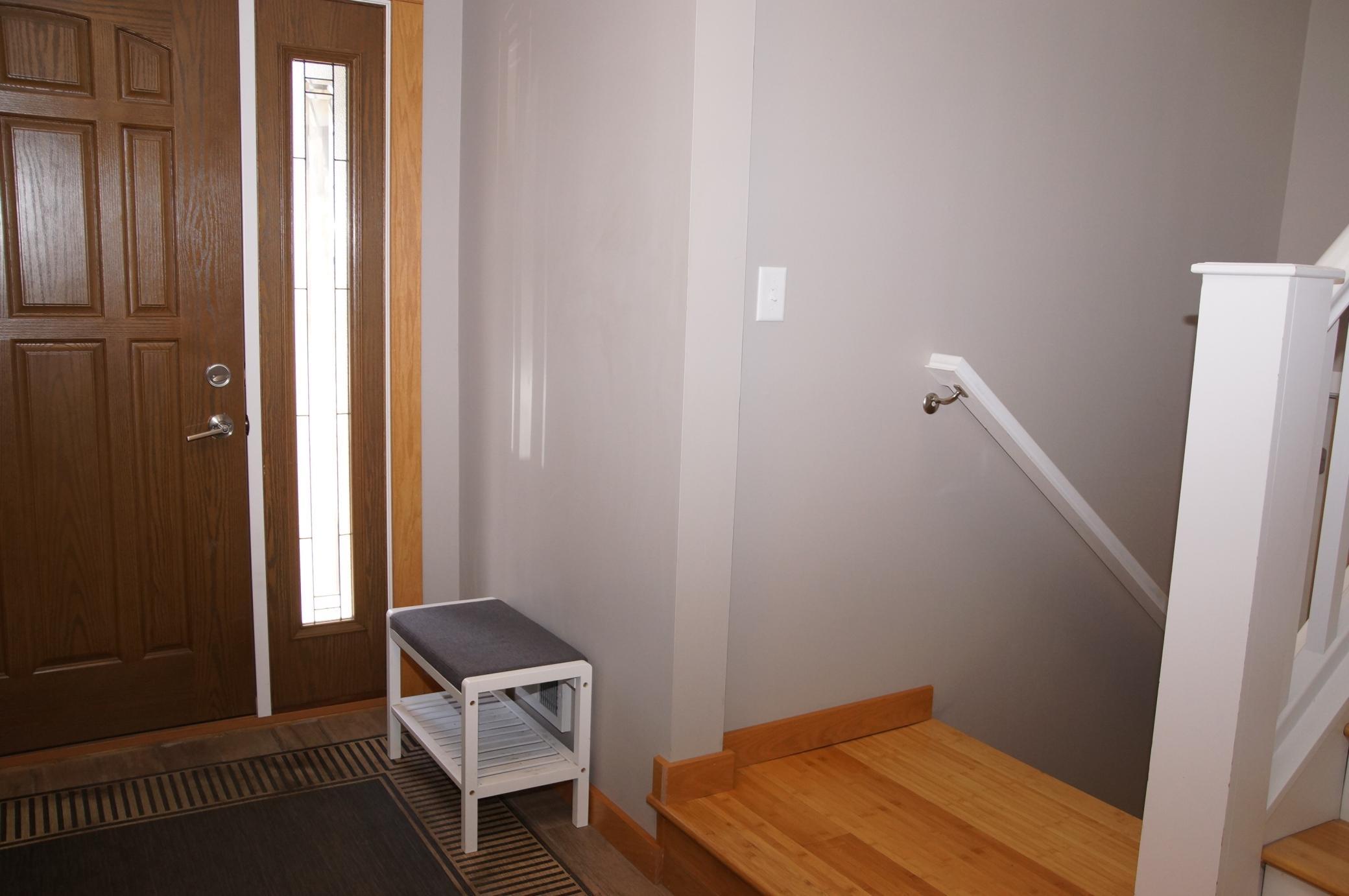 Large Foyer Entry with Good Size Closet and Doorway Directly in to Garage!