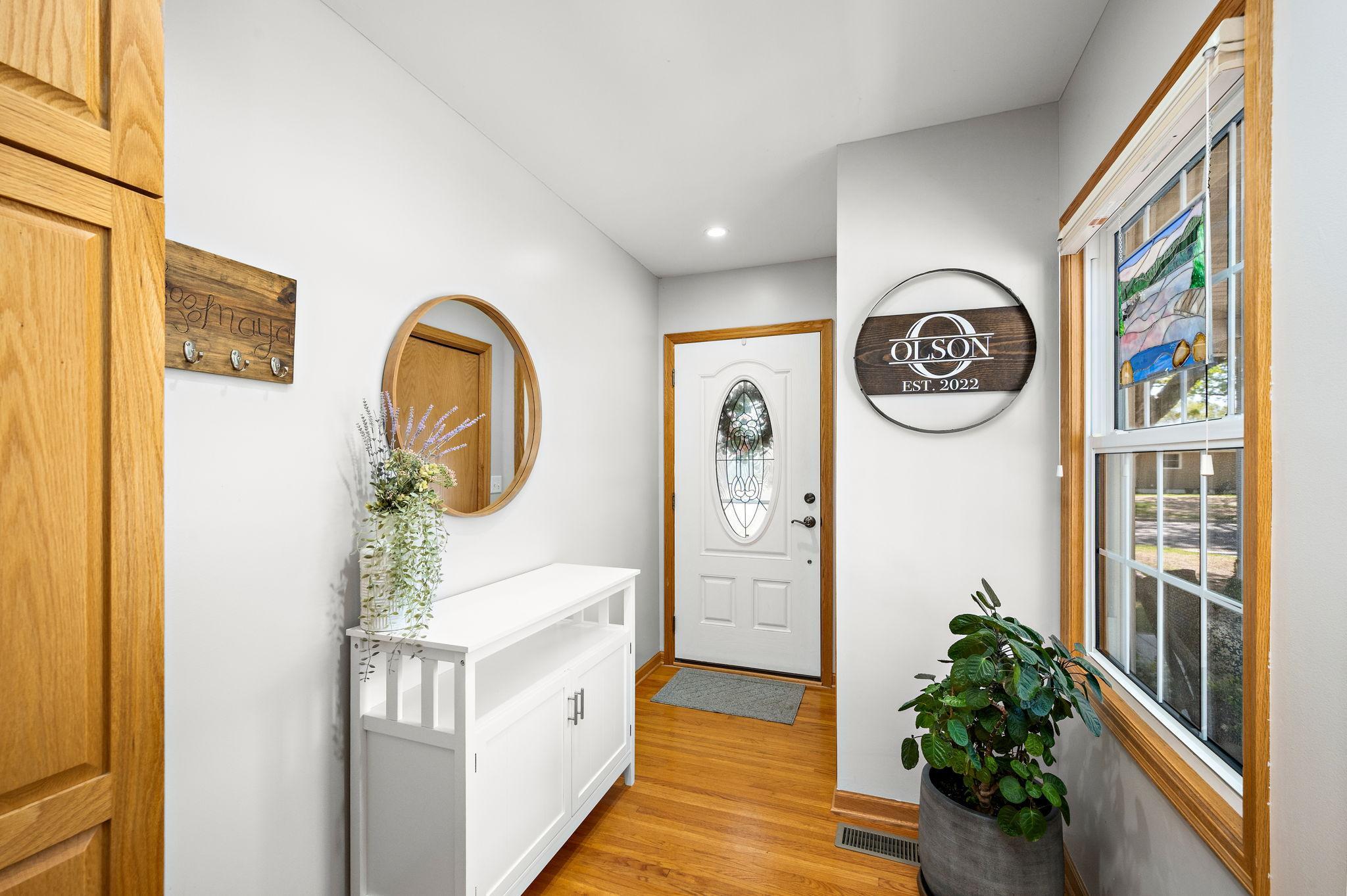 Bright foyer as you enter giving a cozy feel immediately.