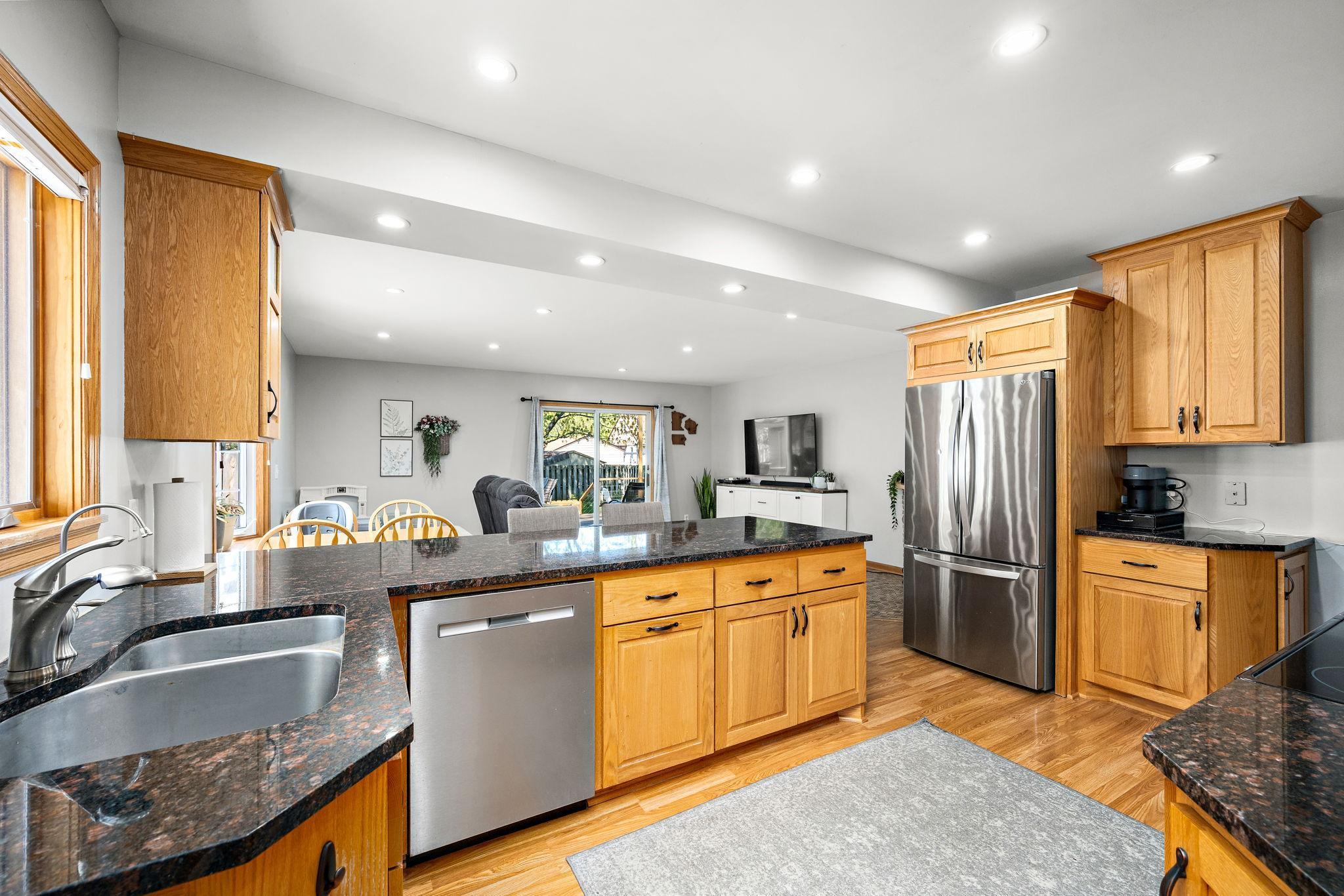 The kitchen layout is so smart and keeps you in the conversation while you prep for your guests!