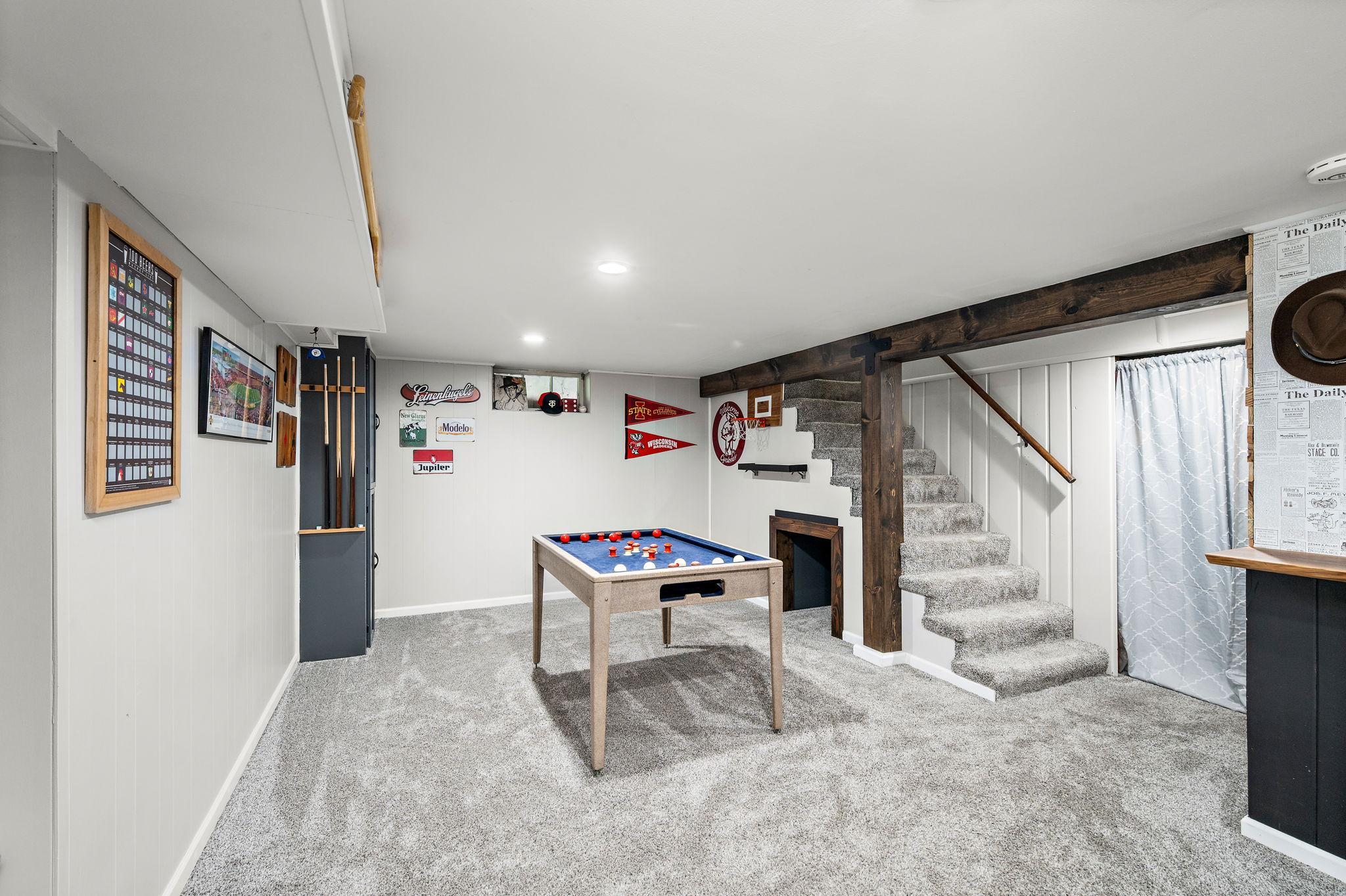 Continue the lower level entertainment space. Bumper pool anyone?