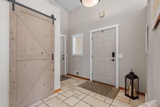 The foyer - spacious and bright with an entry closet