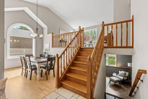 Enjoy the open feel of the lofted family room overlooking the dining!