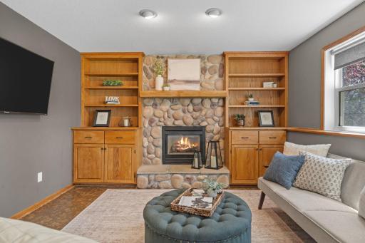 Fantastic fireplace to cozy up at in the cooler months with built ins.