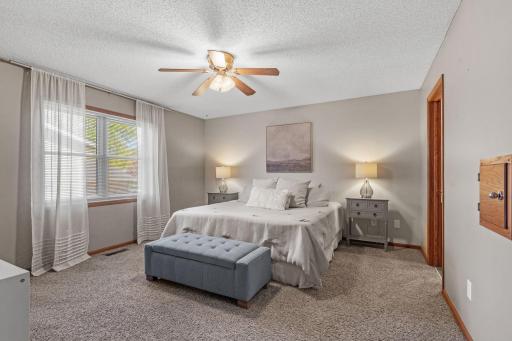The primary suite! This spacious bedroom has a private bathroom & walk in closet.