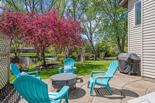 Patio area overlooks the serene backyard!