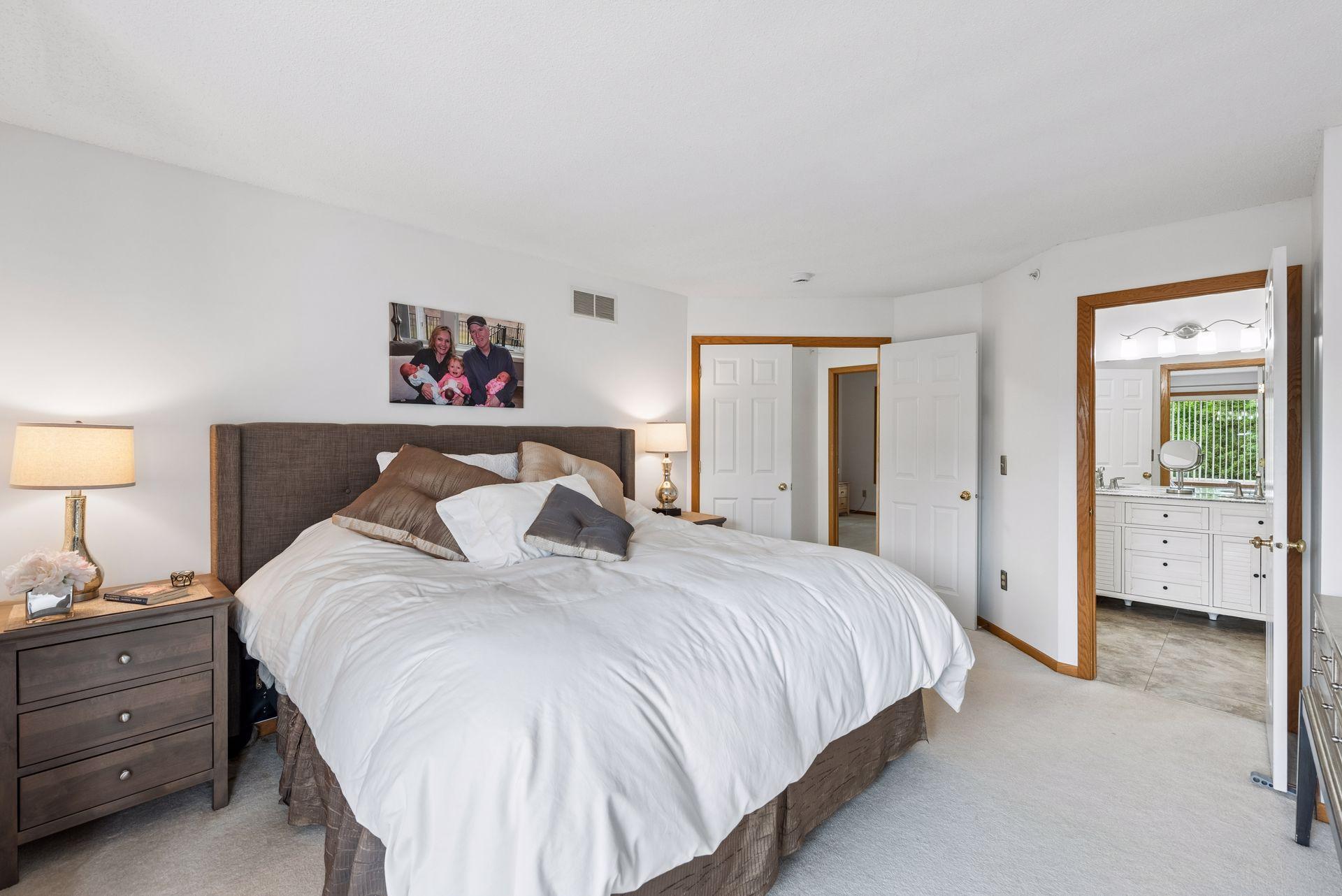 The spacious master features a bay window and an exceptionally large walk-in closet with built-in organizers.