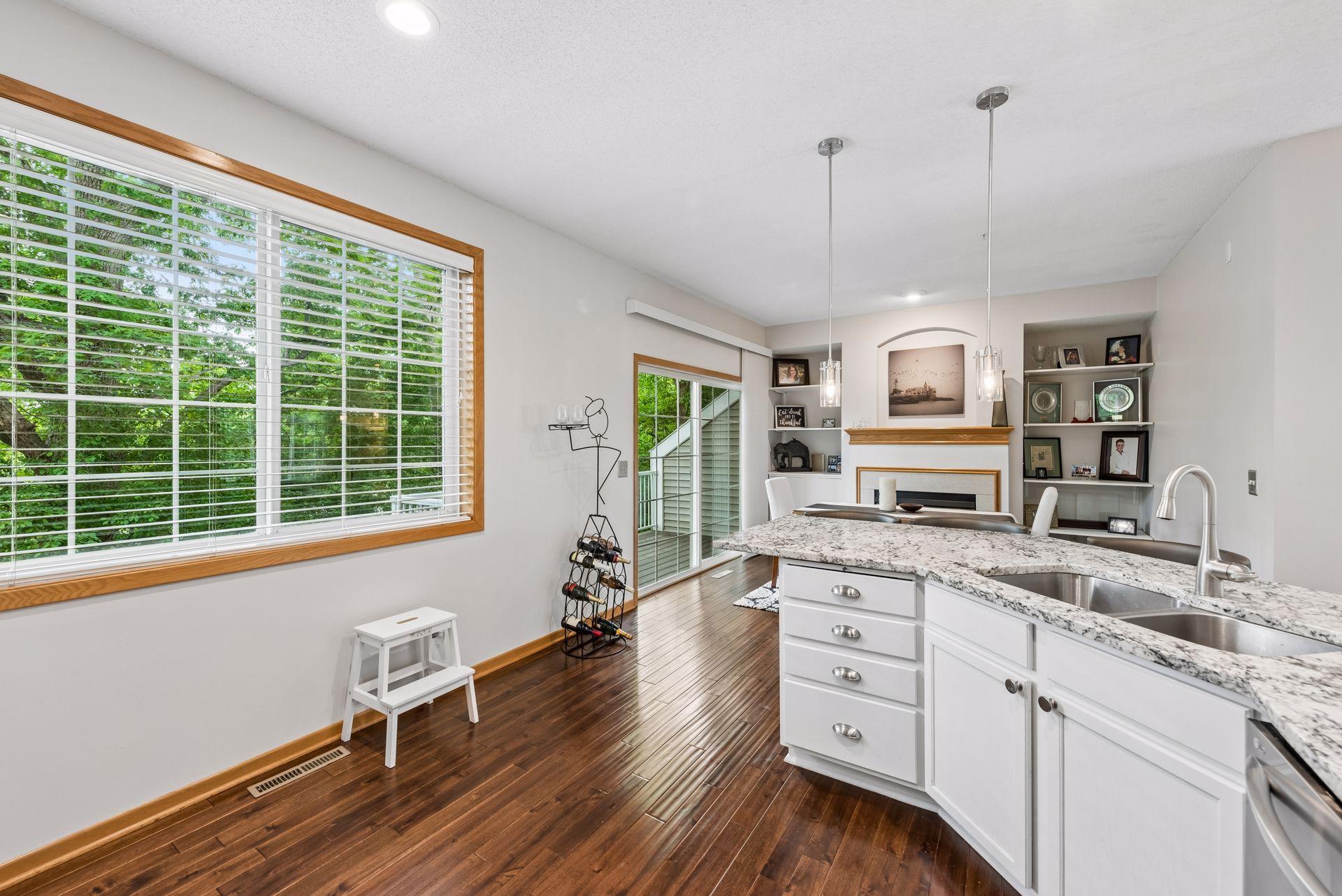 Dining room is open to the kitchen and to the sliding doors to wonderful views.