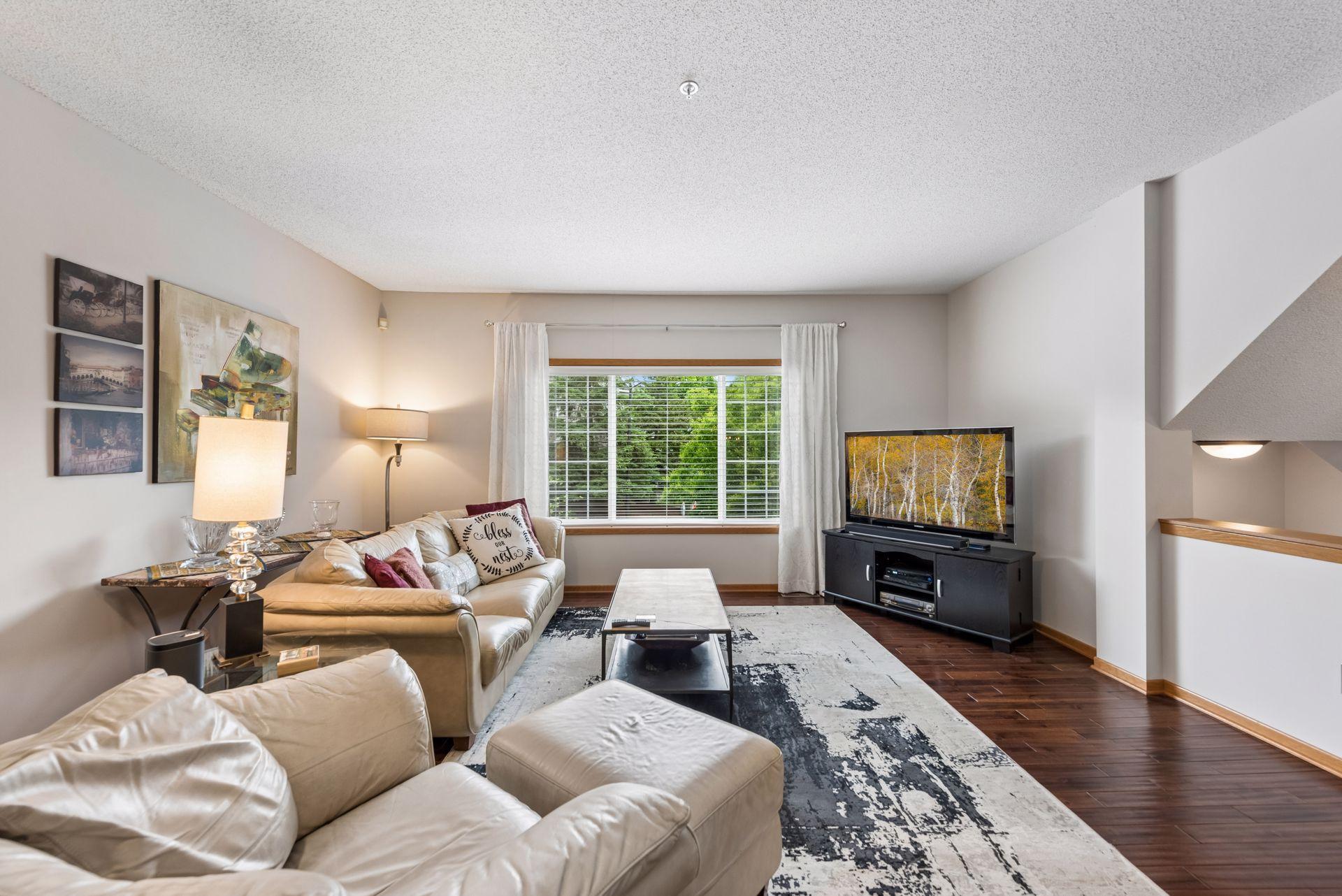 Spacious living room is ideal for evening relaxation and time with family.