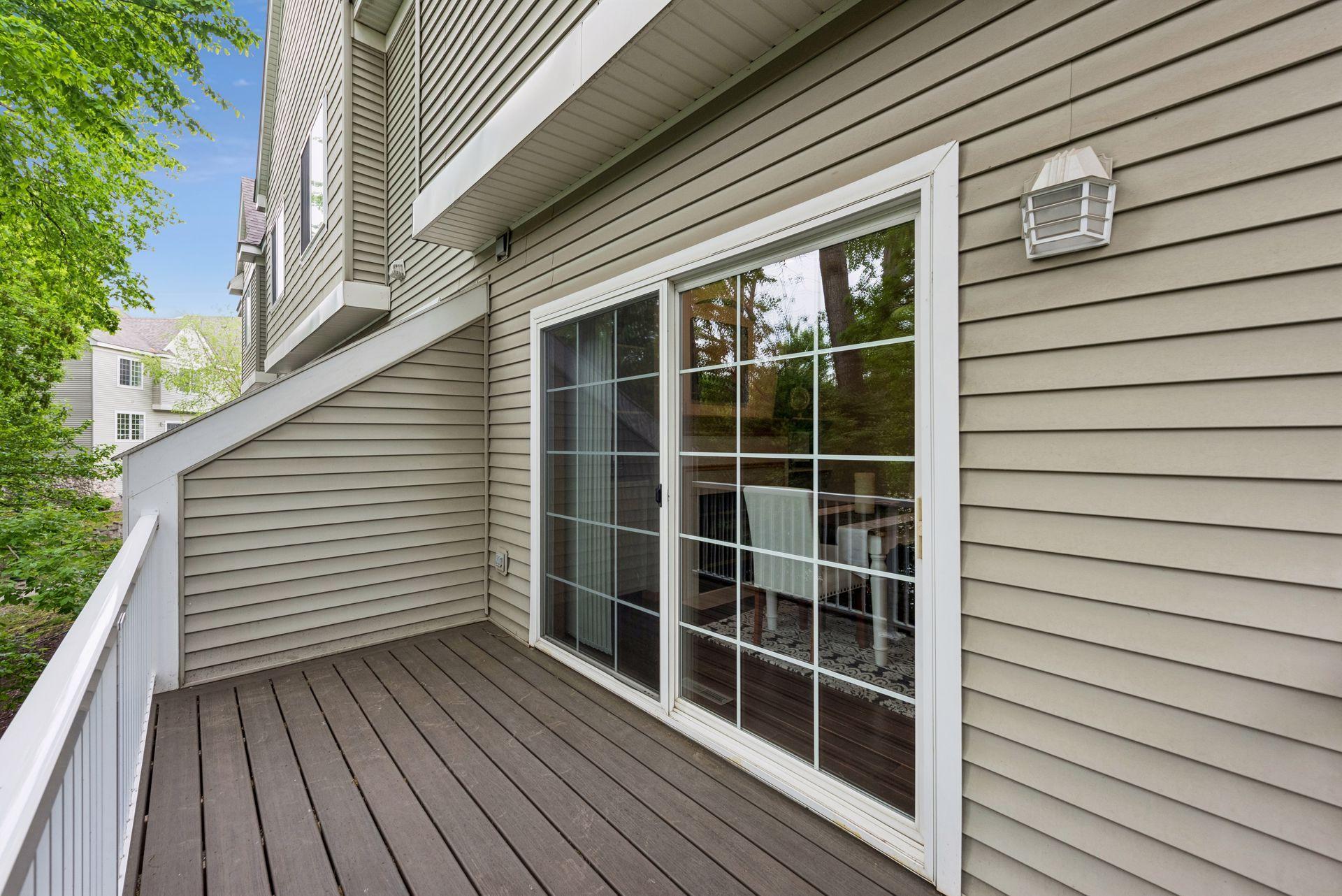 Inviting private deck off the dining room is perfect for morning coffee or a cool beverage on summer evenings.
