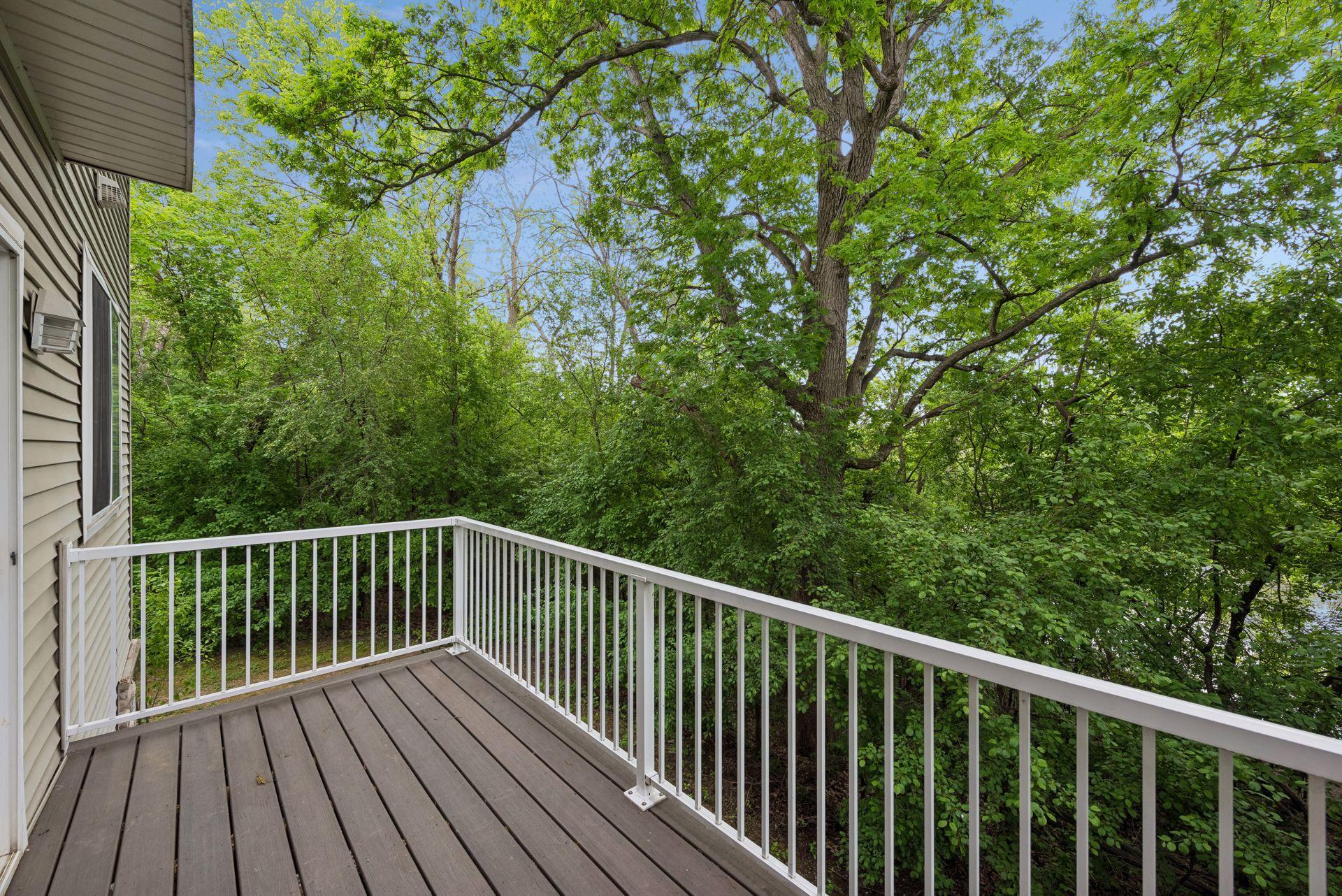 Inviting private deck off the dining room is perfect for morning coffee or a cool beverage on summer evenings.