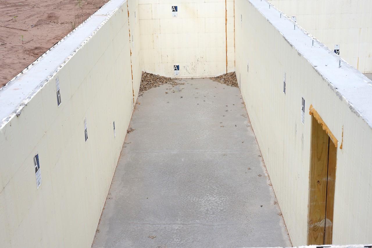 Concrete room facing North.