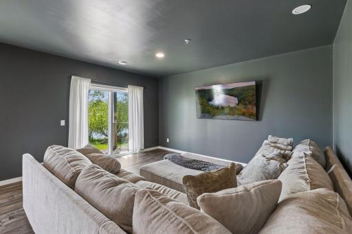 Lower level perfect for movie nights and hanging out. Open floor plan for various uses.