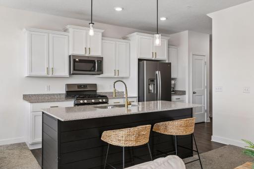 Another angle of the kitchen where the pantry is featured! A great plus.