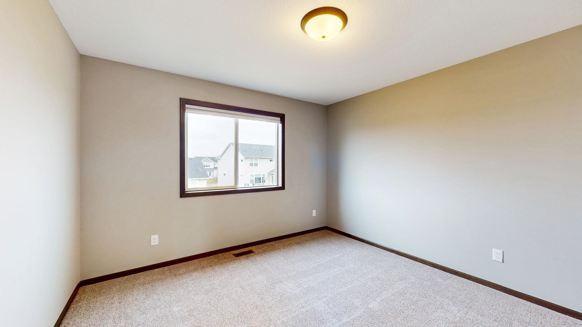 Another view of 3rd bedroom with new carpet