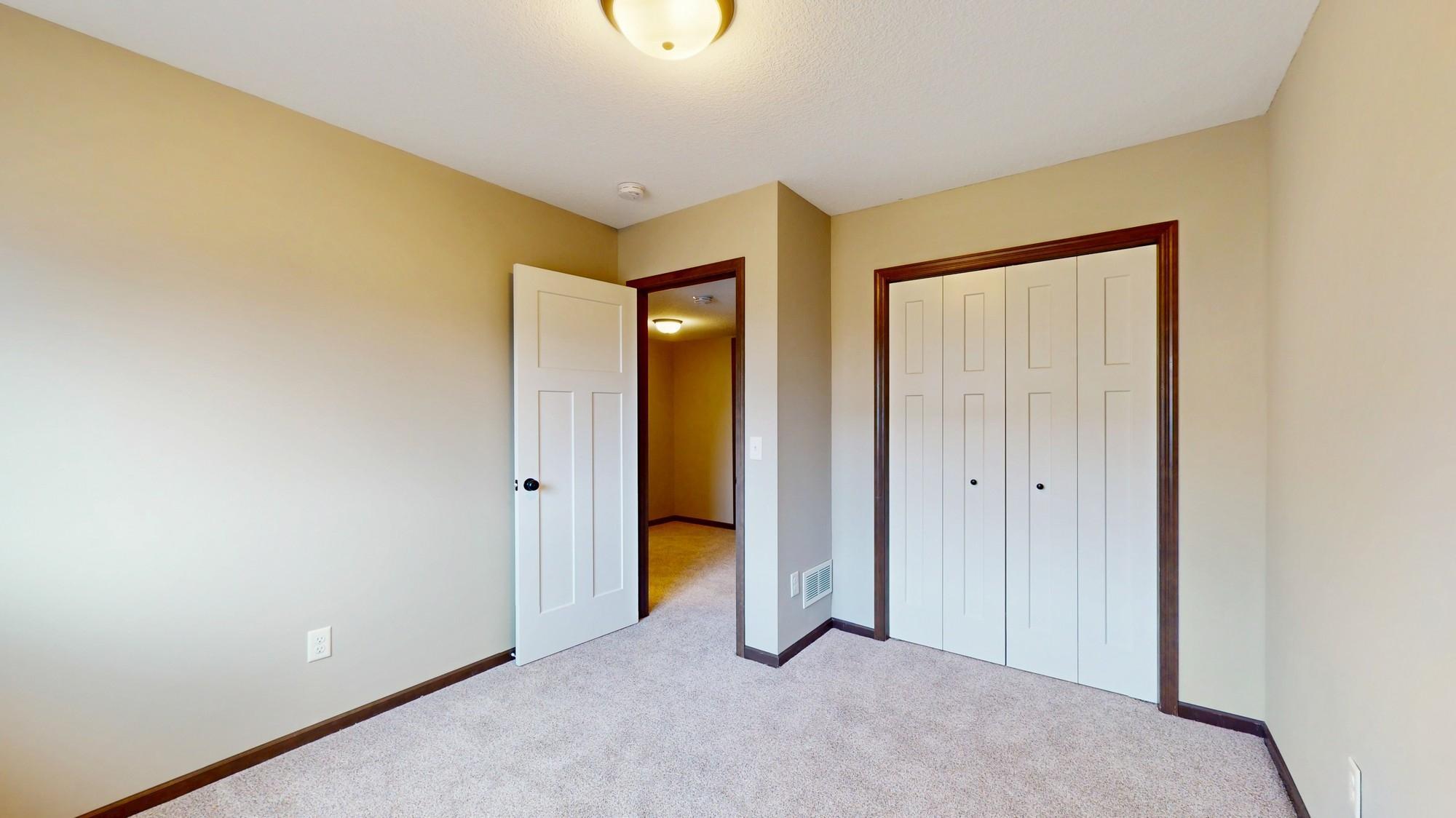 Another view of the 5th bedroom with new carpet