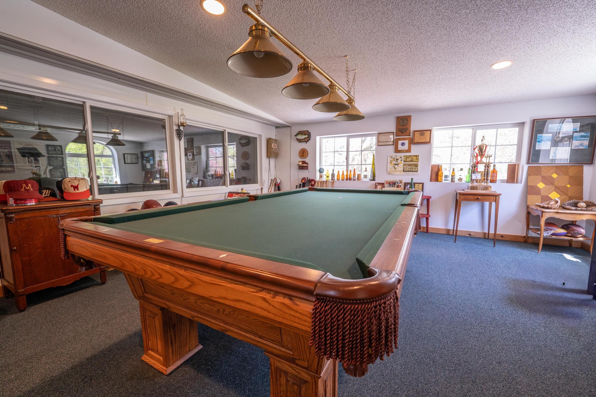 Seller is willing to leave the pool table for the buyer as well as some other items in the shed. This is a fantastic place to host parties, or just hang out. It's a very unique space with insulation, heat, electric and plumbing