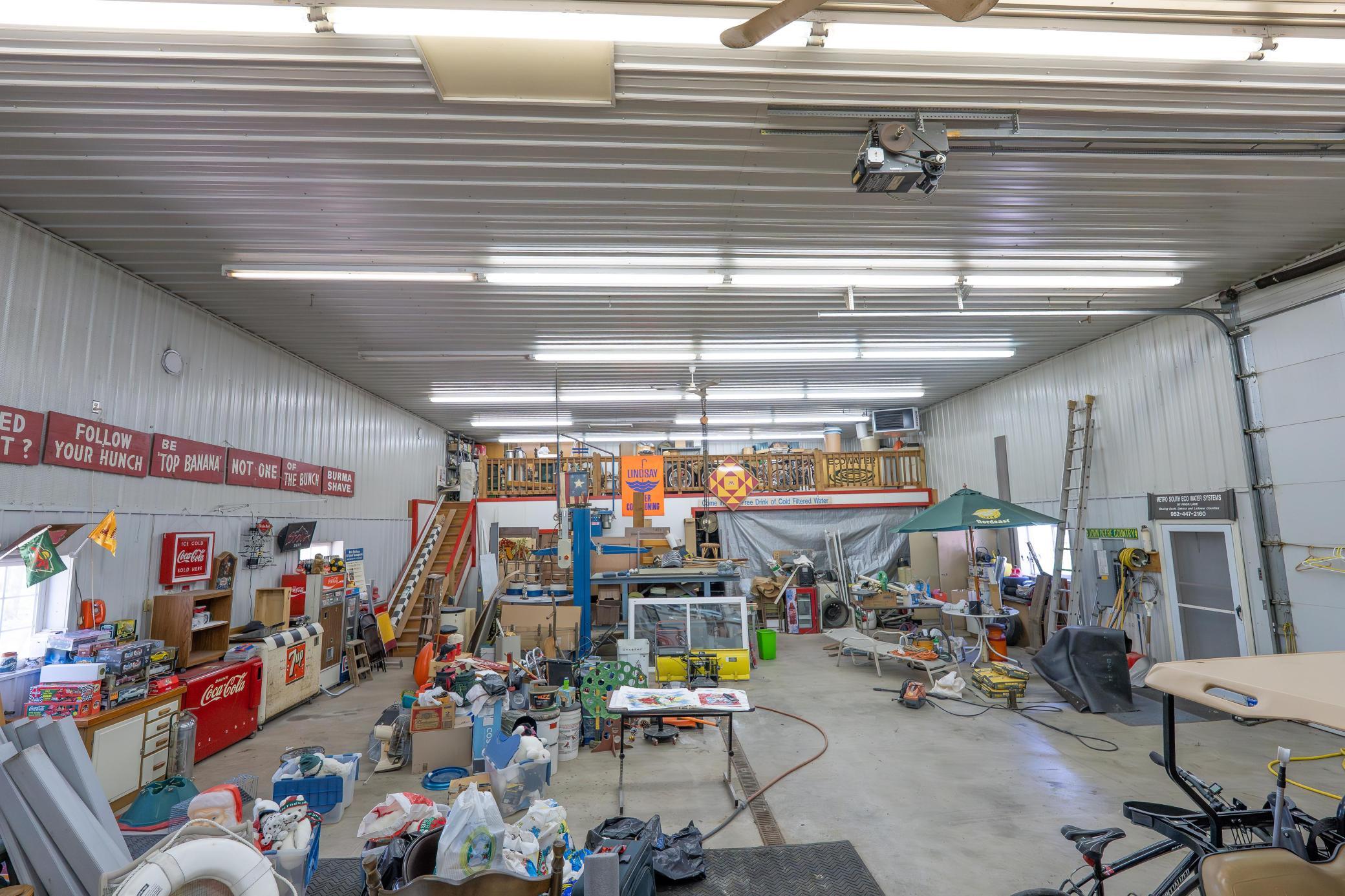 This is a shot of the center of the shed. Notice the 15 foot door on the right. At the back of the shed is an upper storage area and below that a shop. This place is set up to run a business