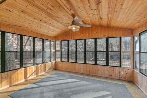 Awesome 3-season porch just off the dining room overlooking a fenced in back yard.