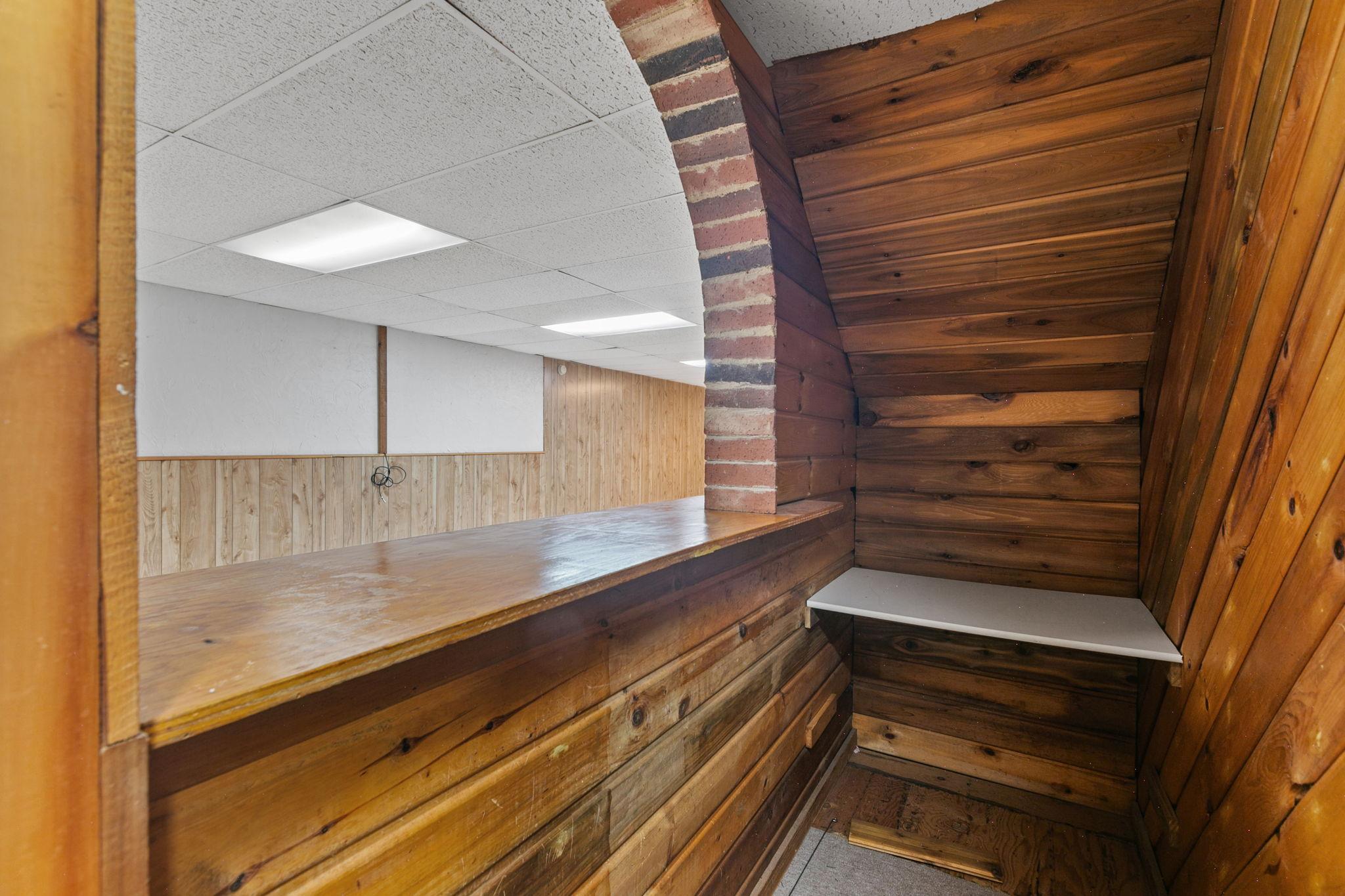 Built in bar under the stairs.