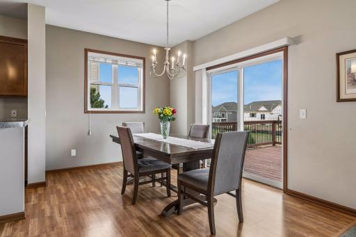 There is an informal dining room with sliding doors that lead to the backyard deck.