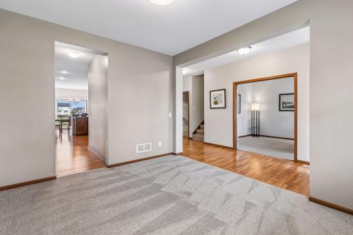 The flex space could be utilized in many ways and does have a pass through butlers pantry to the kitchen.
