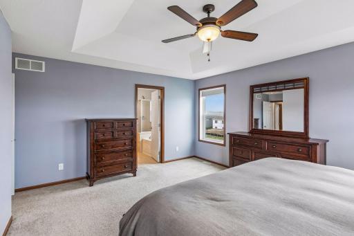 The private primary suite includes a 10x6 walk-in closet and private 4-pc bath.