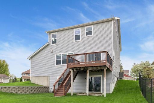 The walkout door to the backyard is under the deck.