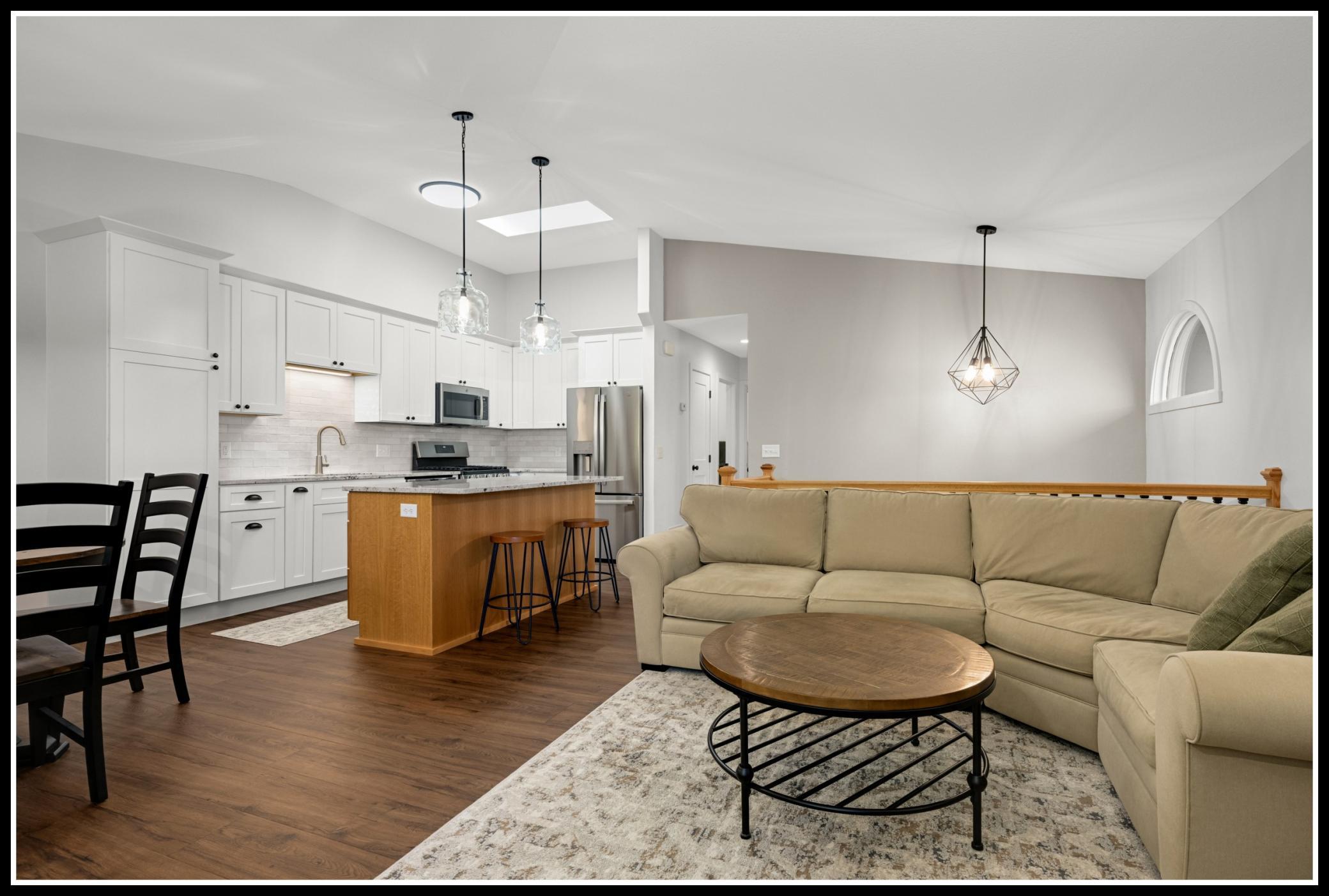 Vaulted ceilings give the upper level an open and airy feel