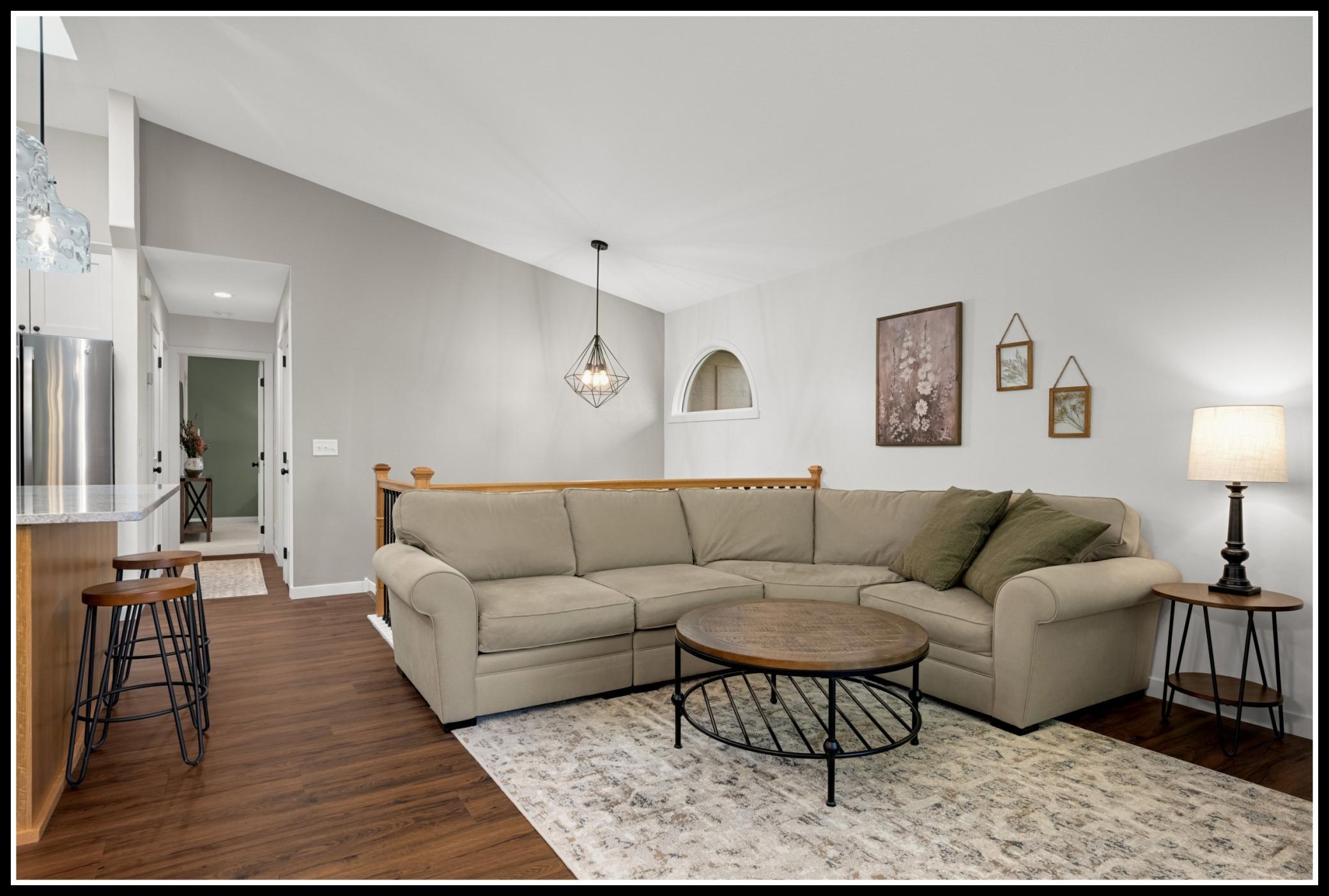 Living room has space for comfy seating and media set-up