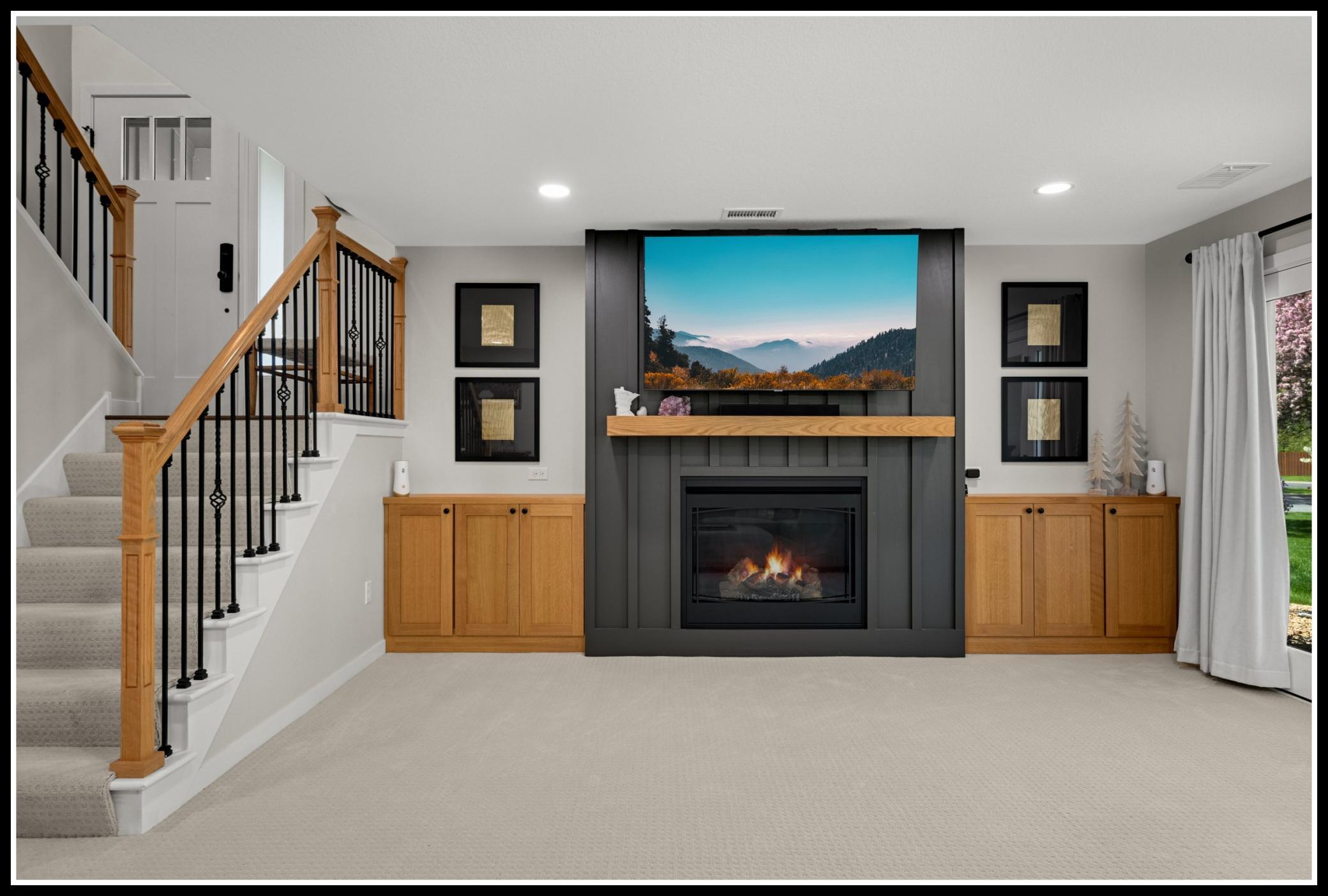 Gas fireplace and custom surround with built-in cabinetry