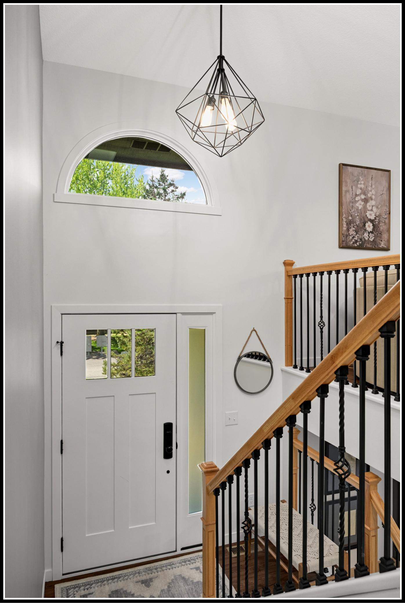 Welcoming front entry with vaulted ceiling