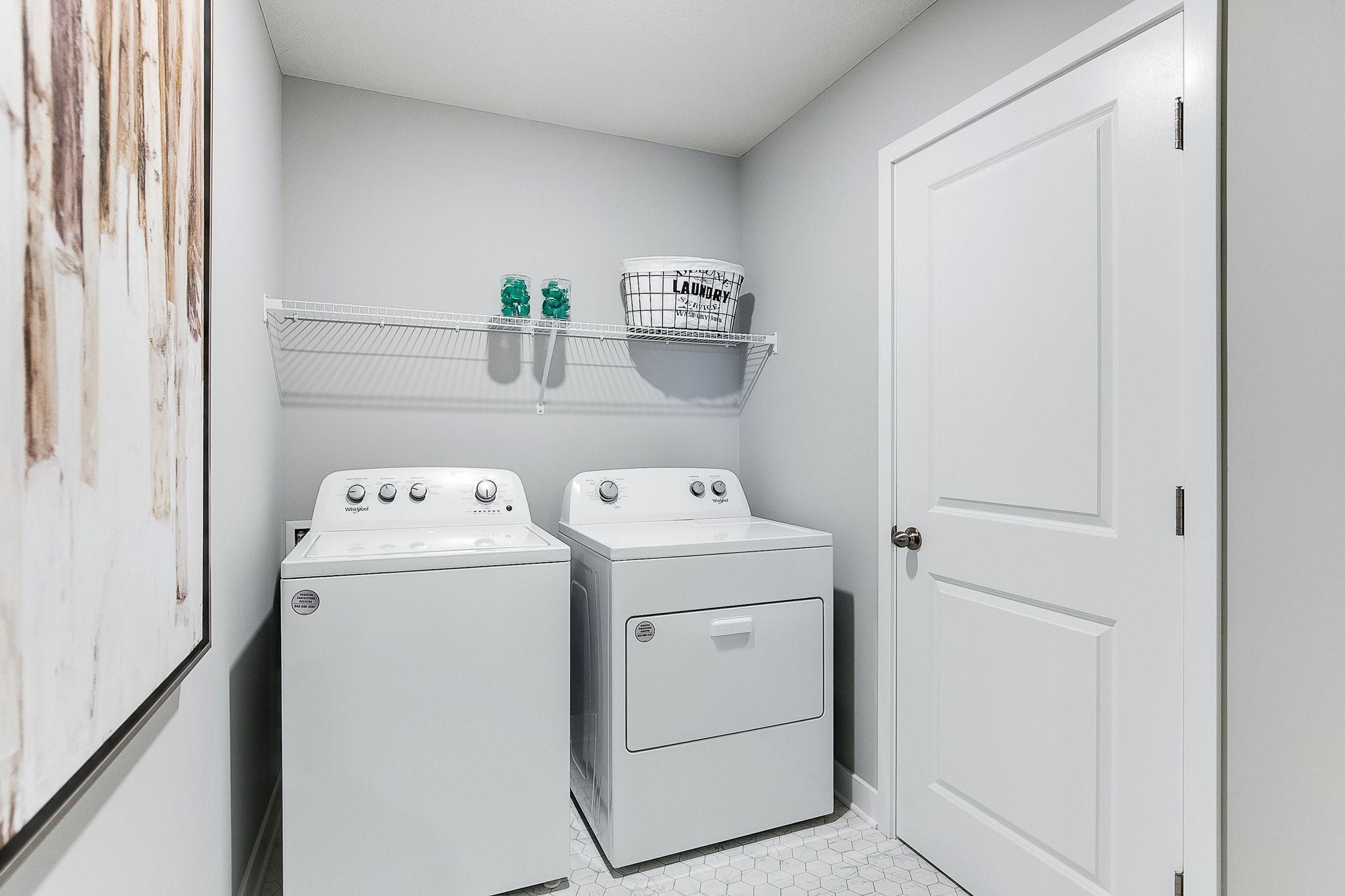 Bedroom level laundry. Model photo. Options and colors will vary.
