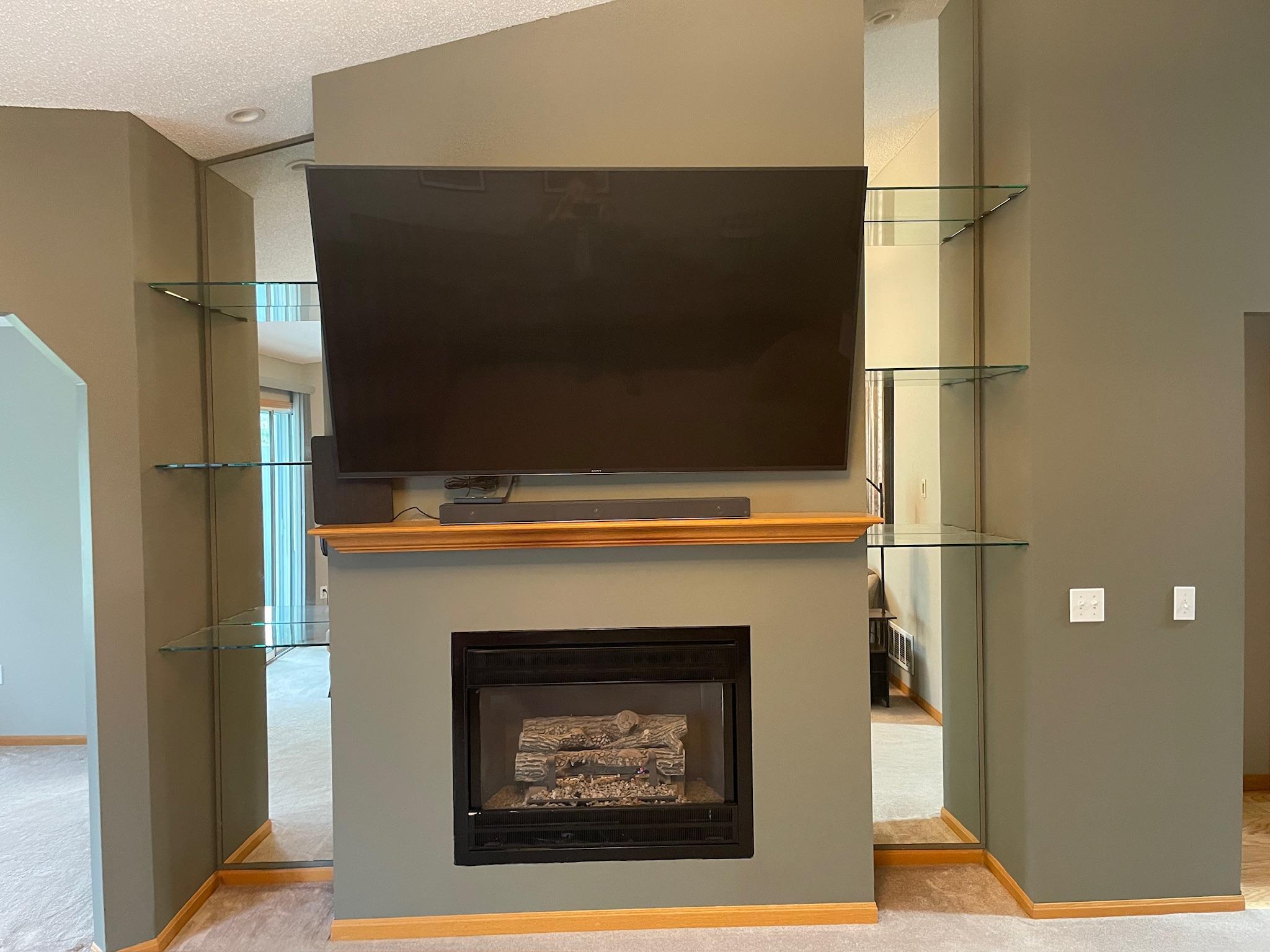 Mirror backed inset shelves, added lighting, vaulted ceilings in living room