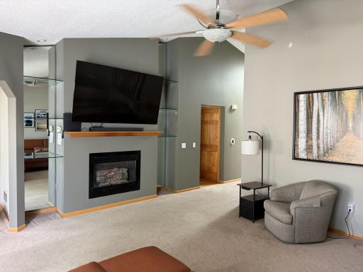 Fireplace, Custom Fan, Mirror/Glass shelves both sides of Fireplace