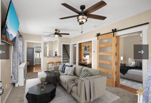 Decorate this space to your needs! The main level living room has plenty of light and stylish modern touches thatadd to the fun in entertaining!