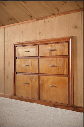 Built-in dresser drawers upstairs means one less piece of furniture you need to add in this private space boasting great neighborhood views!