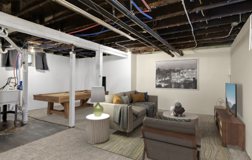 The lower level adds much storage to the home. It also has new carpet and paint! It has a flex space for a workout area or table next to the huge laundry area. This has a great space for a project or folding table.