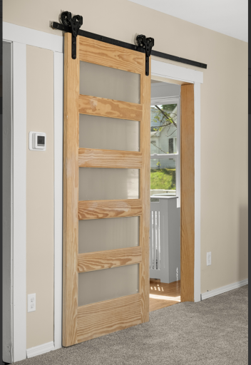 Barn doors into the front bedroom can also be removed to open up more space for the main level. Seller used it as an office.
