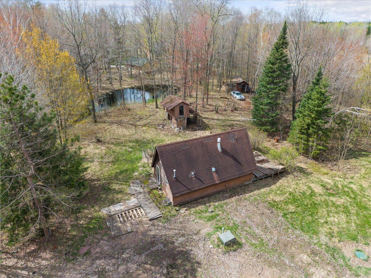 4 car garage and A-Frame storage building.
