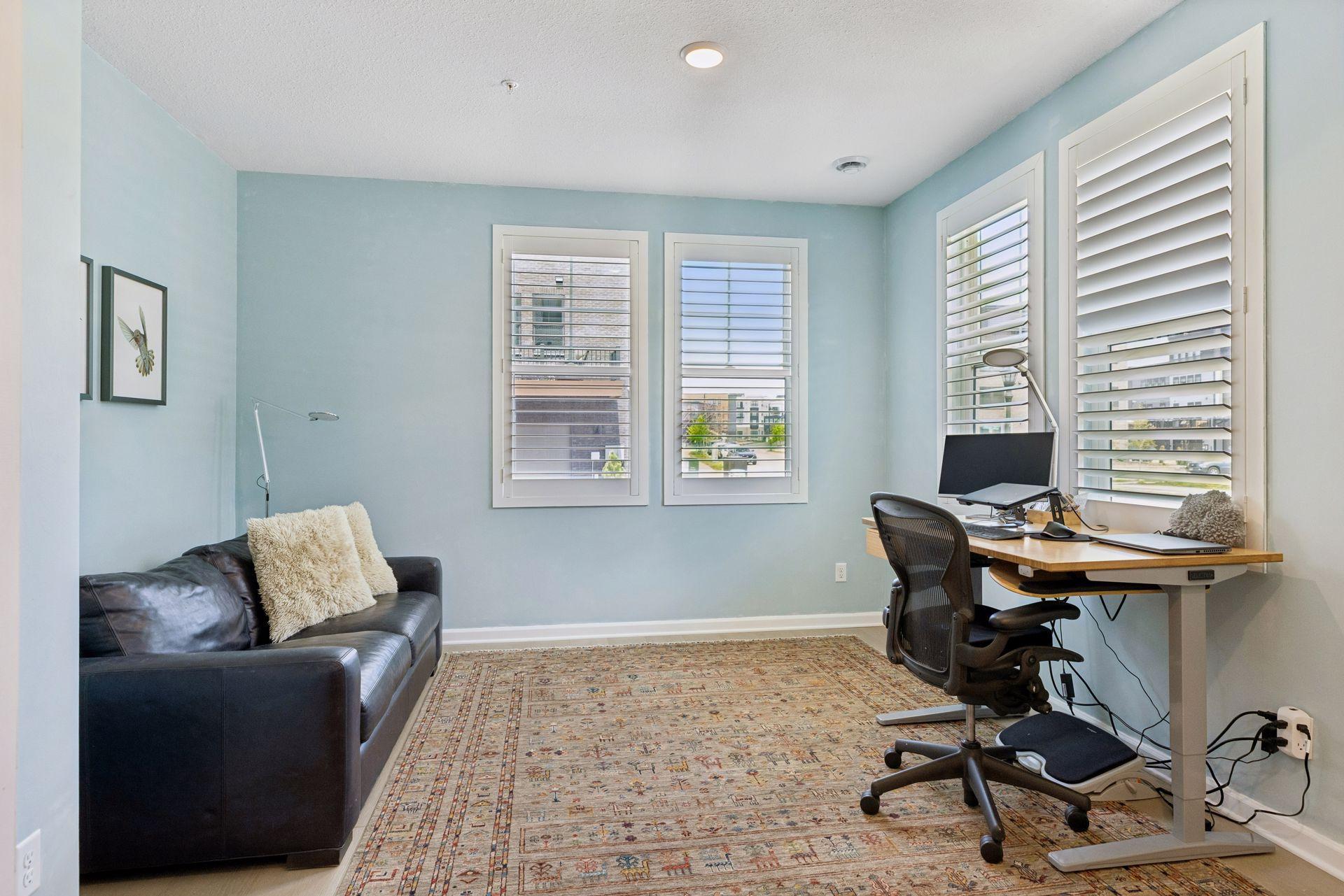 The thoughtfully designed floor plan offers a versatile ground-level flex room ideal for a home office, workout space, or media room.