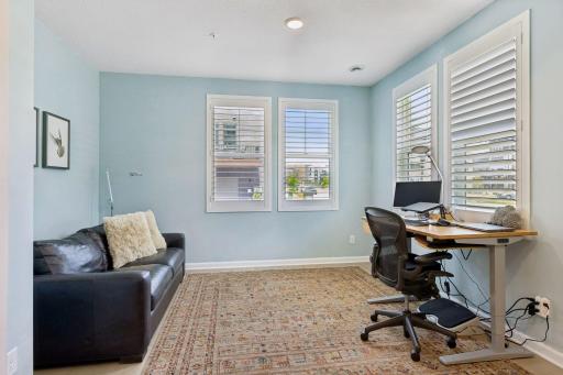 The thoughtfully designed floor plan offers a versatile ground-level flex room ideal for a home office, workout space, or media room.