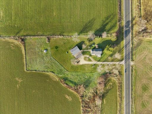 Aerial View of This Stunning 5-Acre Farmhouse Retreat!