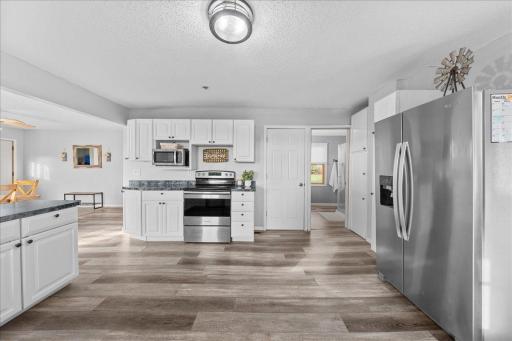 The spacious farmhouse kitchen offers plenty of counter space and room to bake homemade sourdough, gather with family, and enjoy country living at its best.jpg